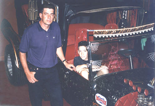 Steve Connolly and son at the Cars of the Stars museum in England